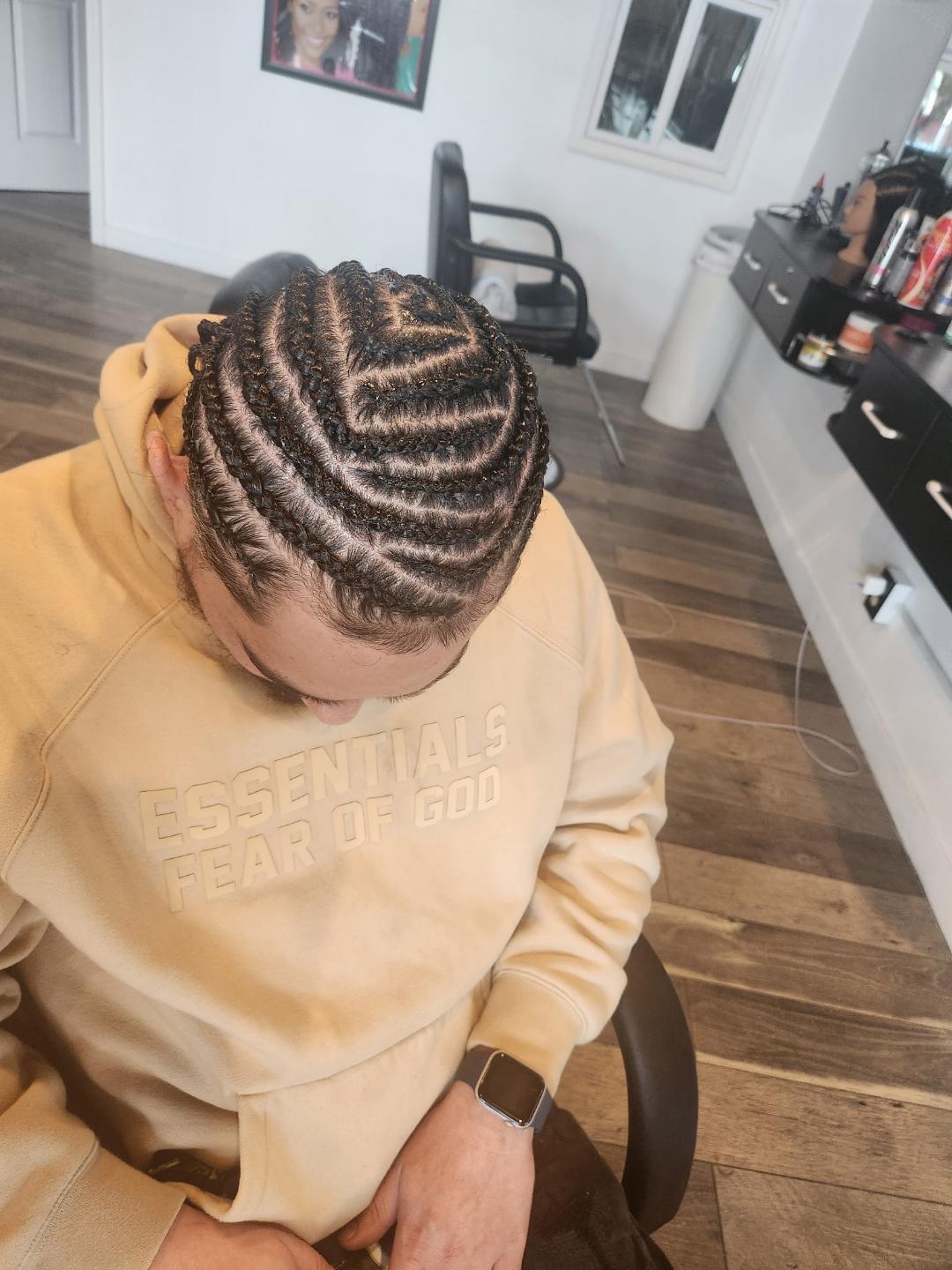 Fresh feed-in cornrows, braided in the studio